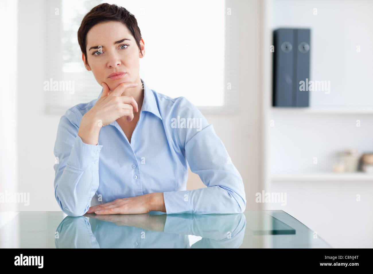 Businesswoman Sitting Behind The Desk Stock Photo   Image Of Papers