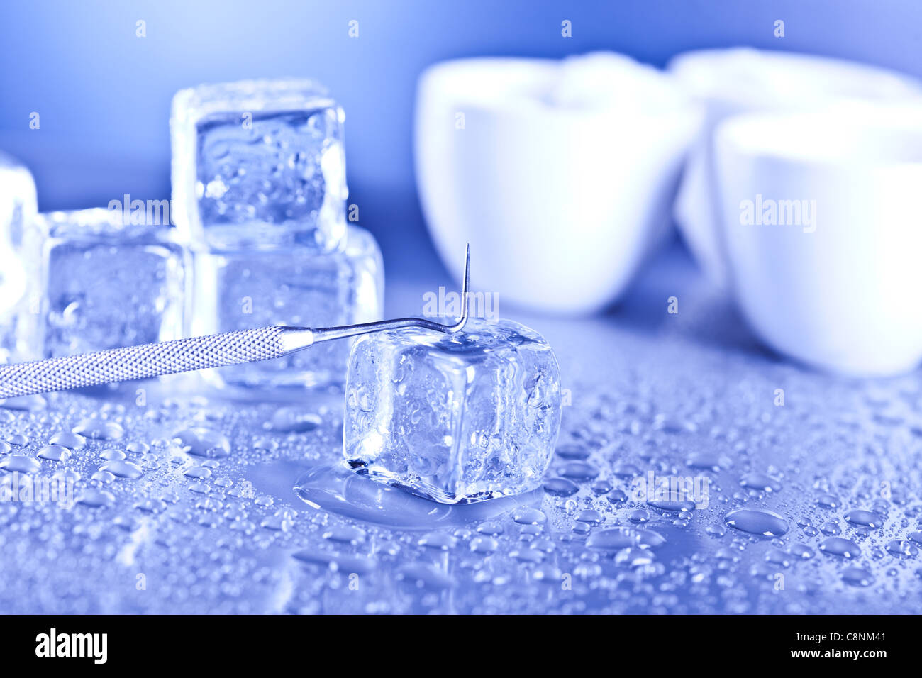ice cubes and water drops on the blue background Stock Photo - Alamy