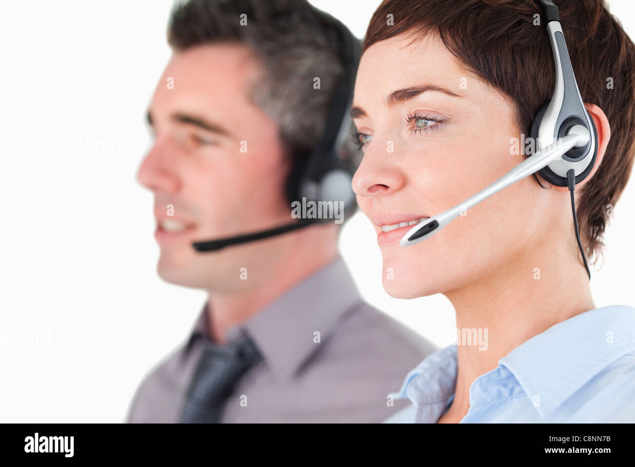 Close up of operators using headsets Stock Photo - Alamy