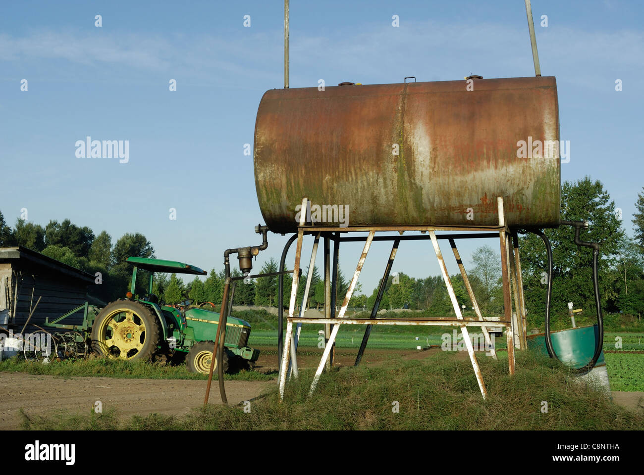 Elevated fuel storage tank used for agricultural equipment Stock Photo