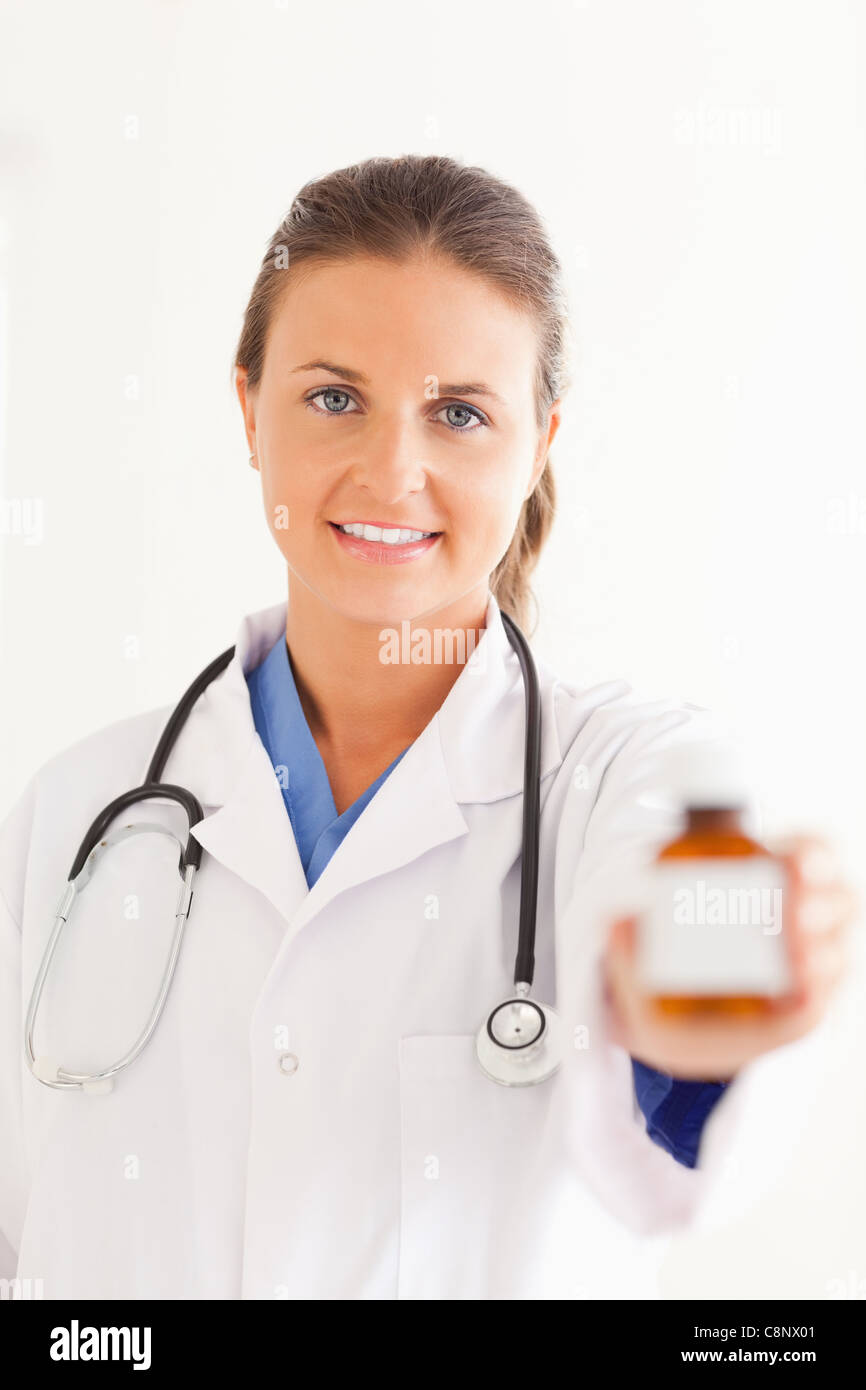 Female doctor handing over hi-res stock photography and images - Alamy