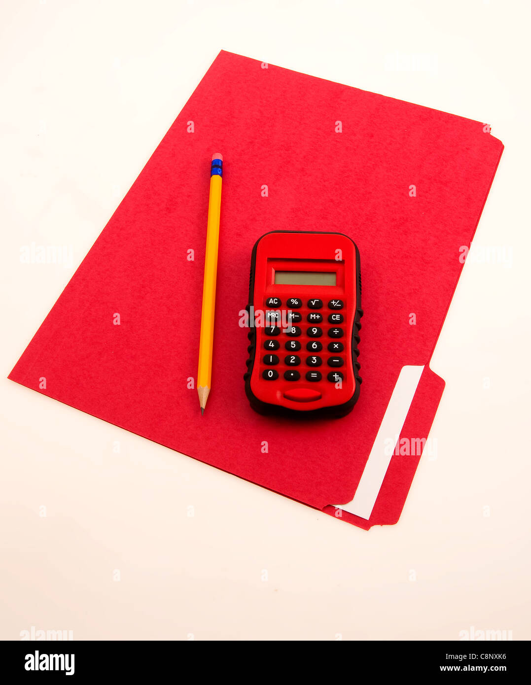 Red Folder and Calculator Stock Photo