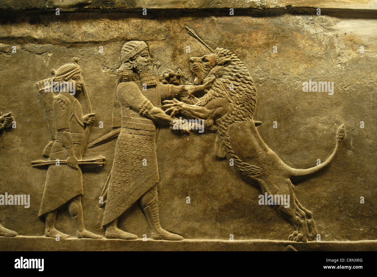 Assyrian relief of the Royal lion hunt of King Ashurbanipal seen at ...