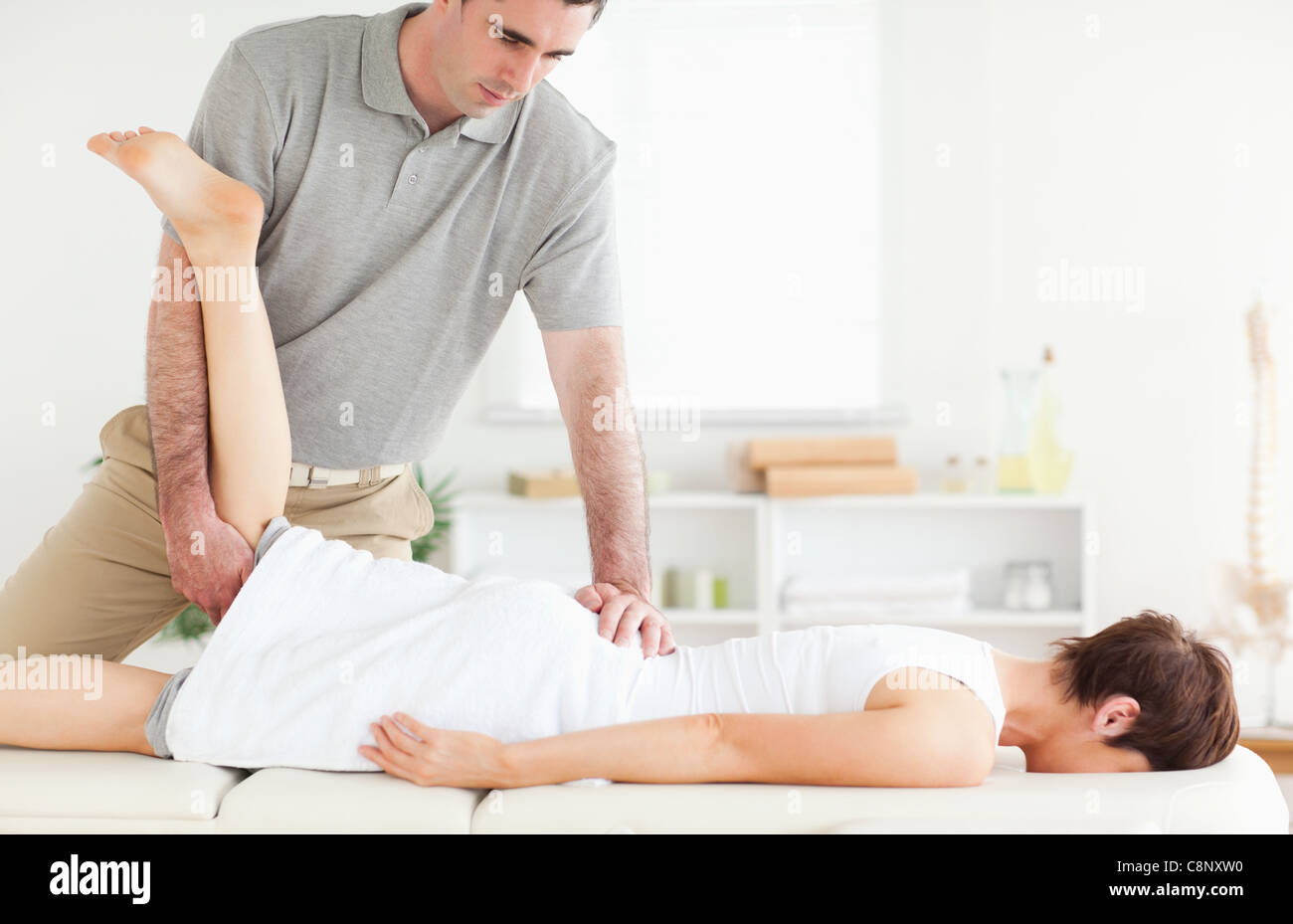 Young man stretches neck hi-res stock photography and images - Alamy