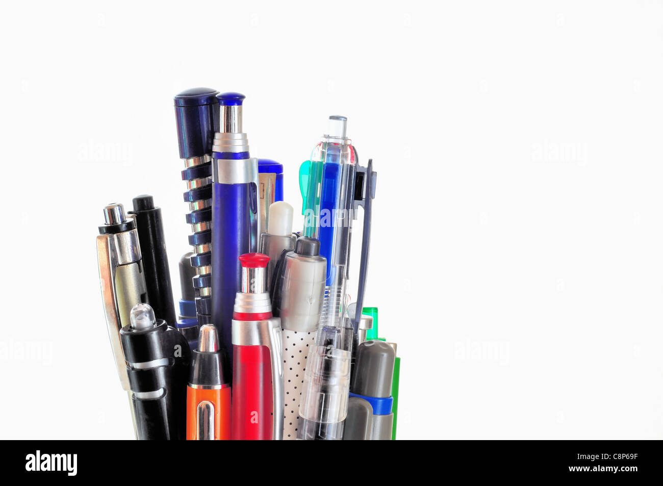 Group of multicolored ball pens on white background Stock Photo - Alamy