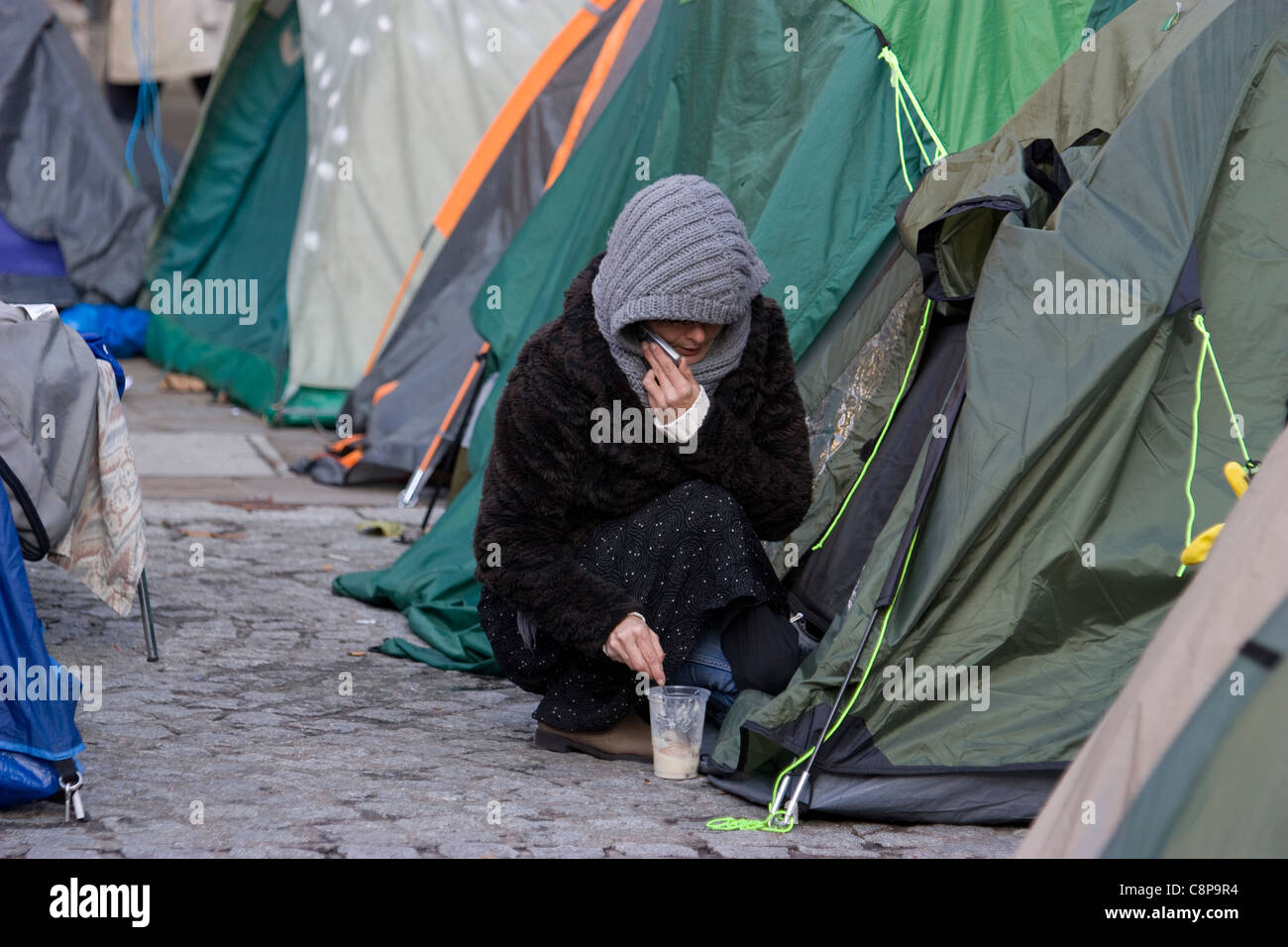 camping protestor at st pauls cathedral, occupy london protest with tents Stock Photo