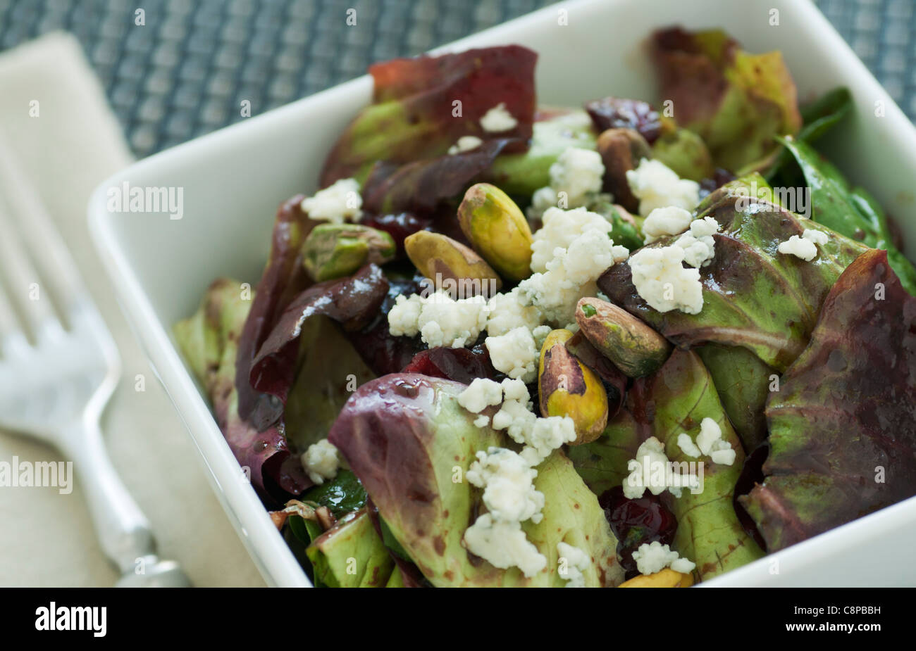 Tossed green salad with blue cheese crumbles, balsamic vinaigrette and