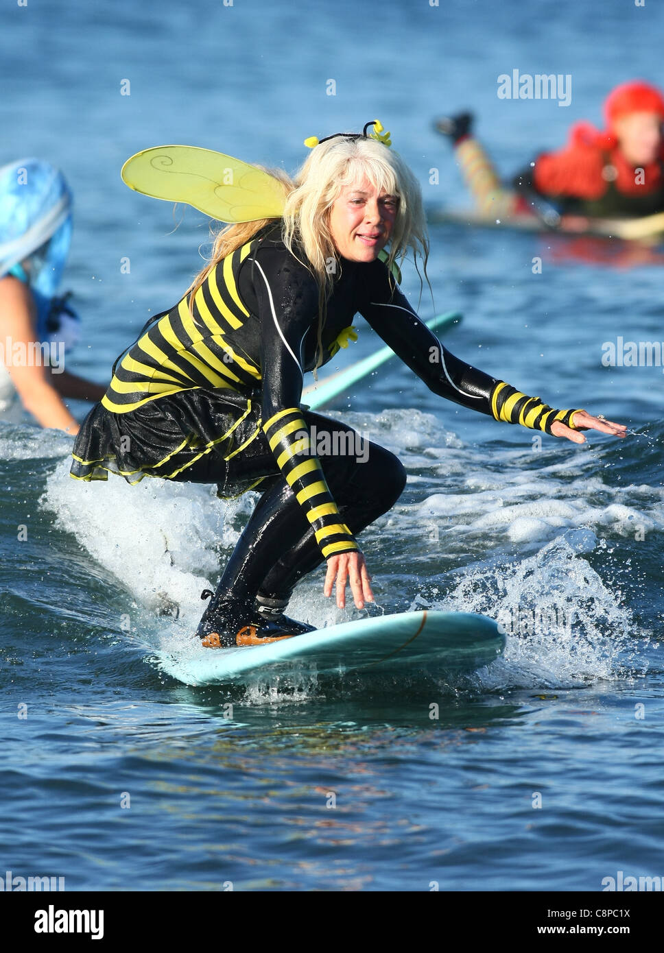 WOMAN SURFER AS BEE BLACKIE'S HALLOWEEN COSTUME SURF CONTEST 2011