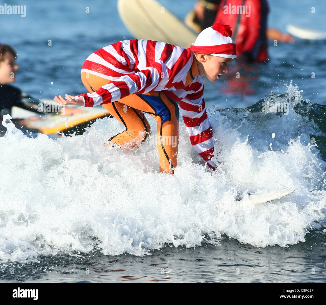 MALE SURFER AS WHERE'S WALLY BLACKIE'S HALLOWEEN COSTUME SURF CONTEST