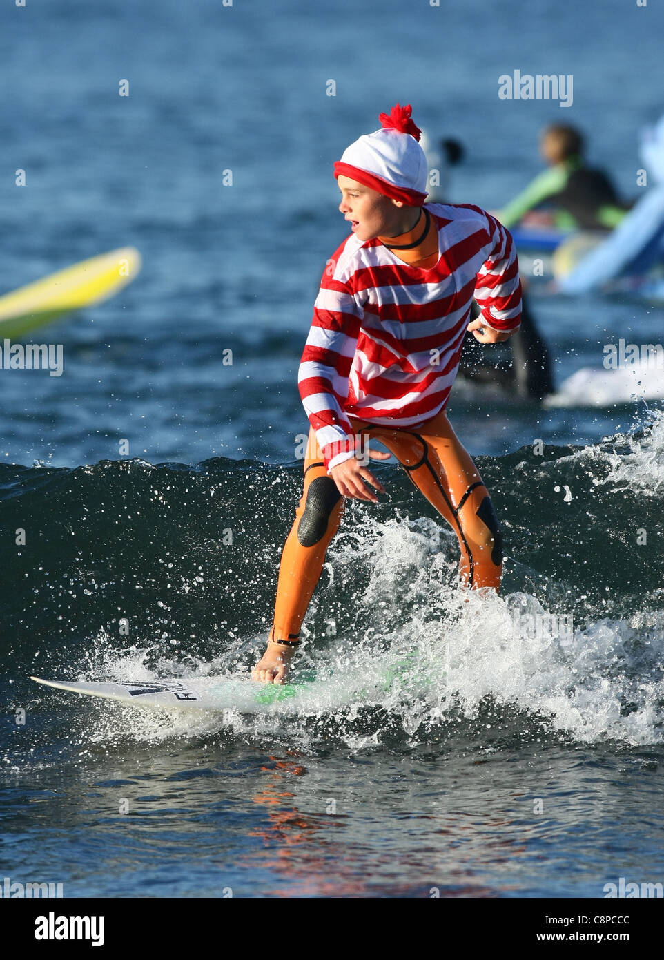 MALE SURFER AS WHERE'S WALLY BLACKIE'S HALLOWEEN COSTUME SURF CONTEST