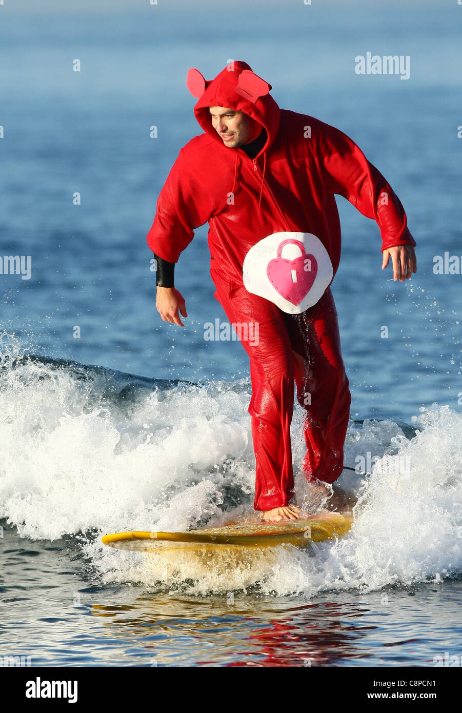 MALE SURFER AS CARE BEAR BLACKIE'S HALLOWEEN COSTUME SURF CONTEST 2011  ORANGE COUNTY CALIFORNIA USA 29 October 2011 Stock Photo - Alamy