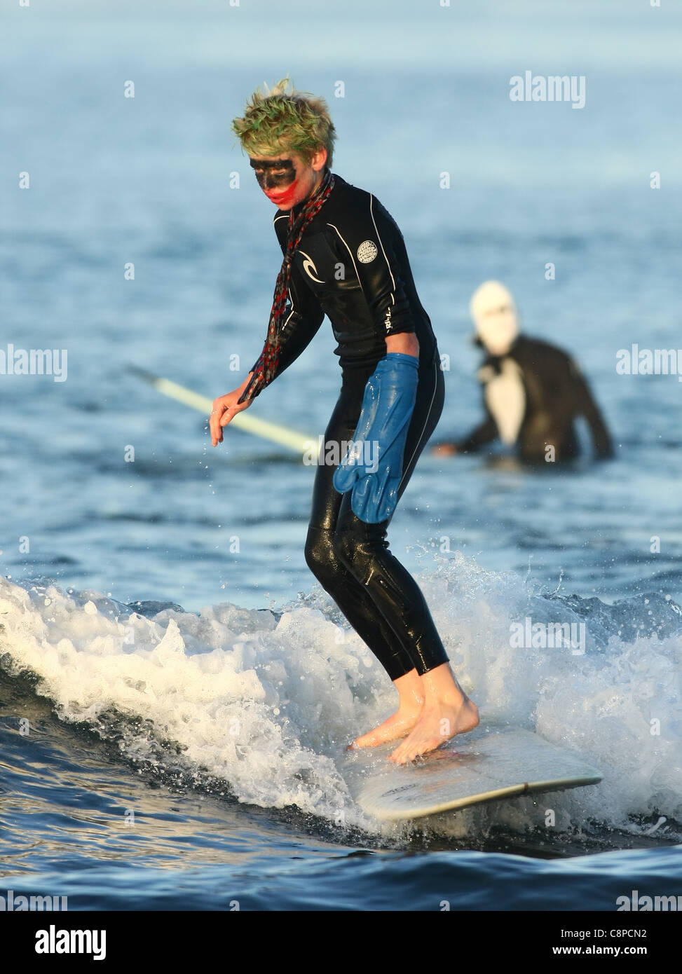 BOY SURFER AS THE JOKER BLACKIE'S HALLOWEEN COSTUME SURF CONTEST 2011