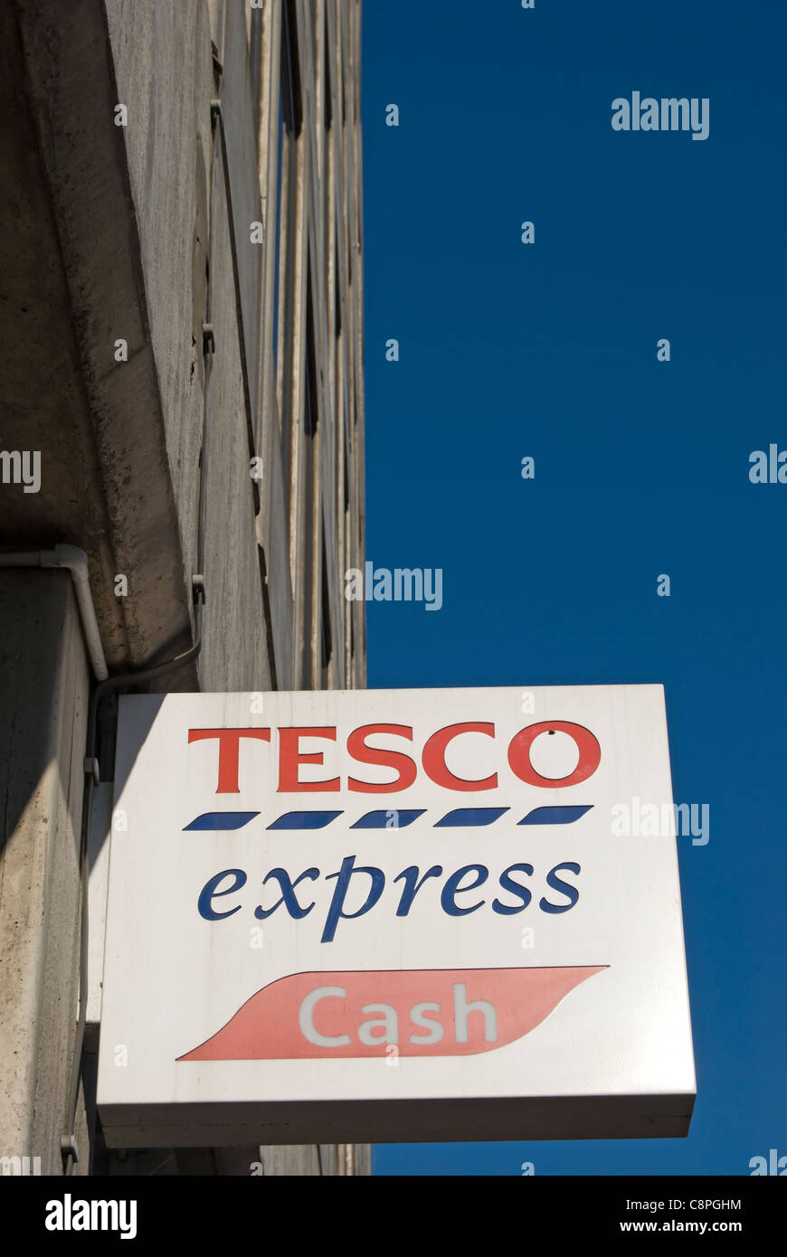 sign for tesco express cash machine, in new malden high street,m surrey