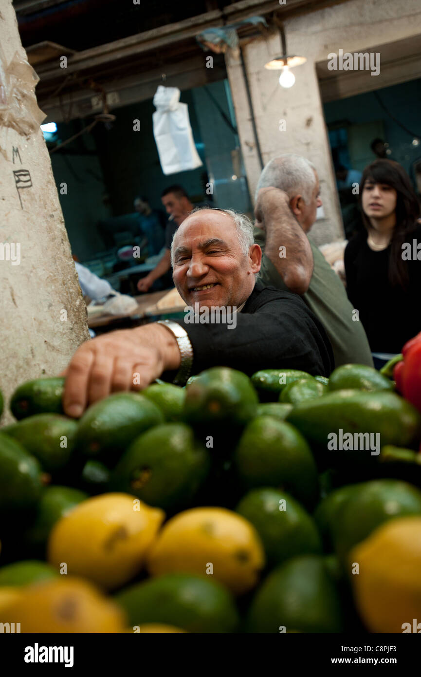 Choosing Avocado with a big smile. Stock Photo