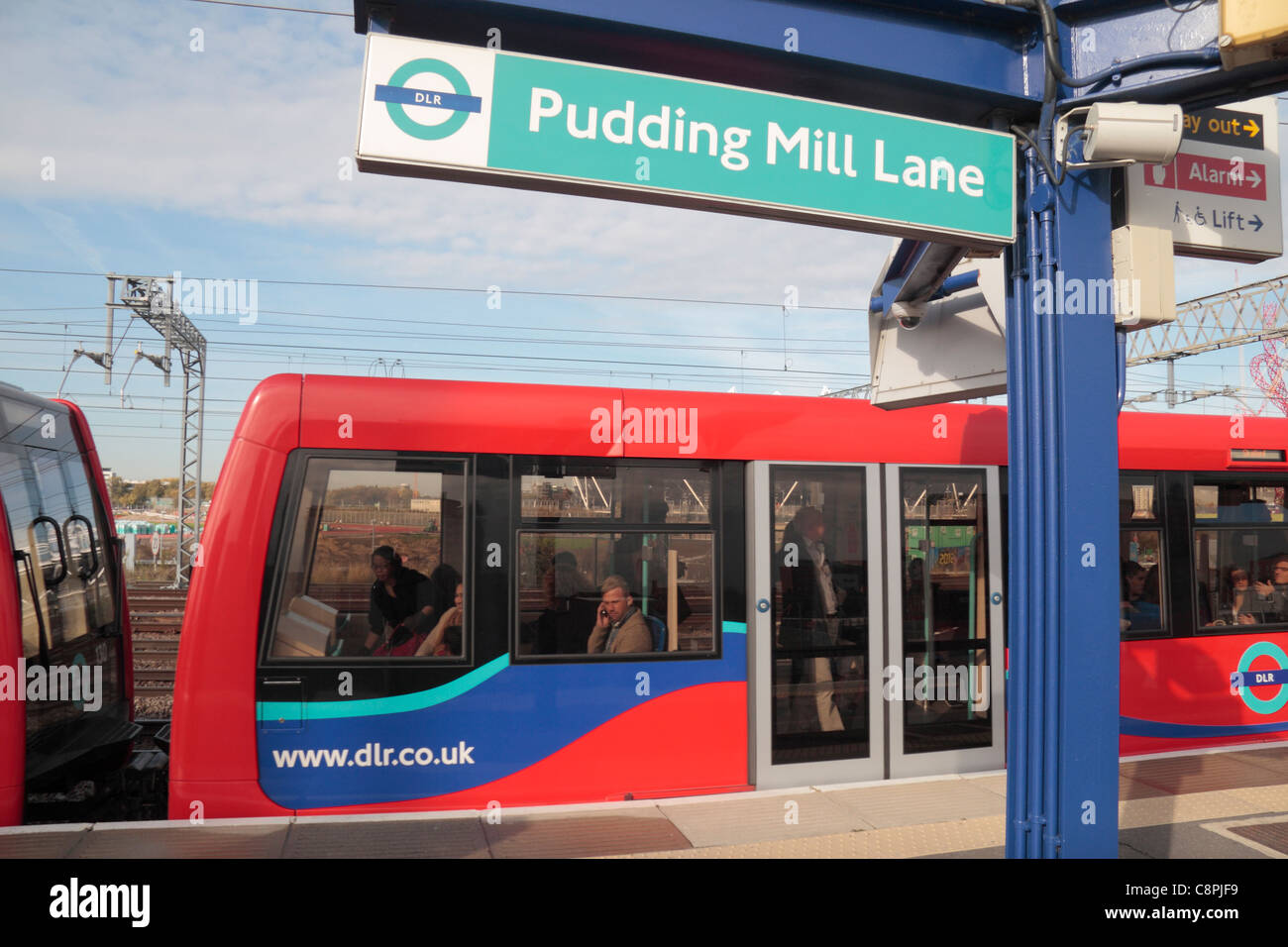 DLR train at Pudding Mill Lane station and the London 2012 Olympic