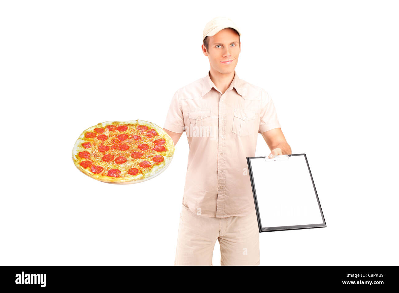 A delivery boy with clipboard delivering a pizza Stock Photo