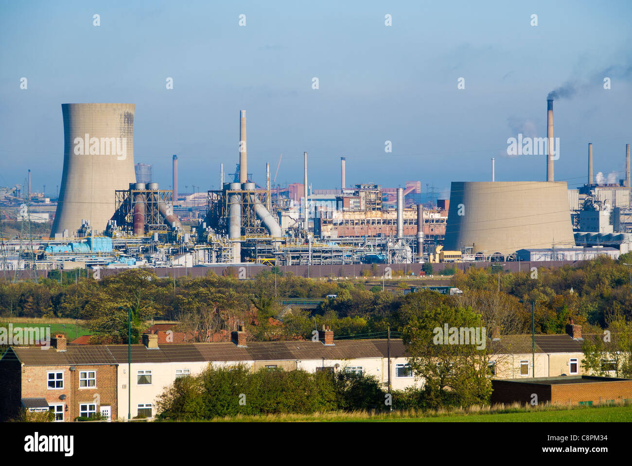 Houses at South Lackenby in front of Wilton site chemical plant and Teesside Gas turbine power station Stock Photo