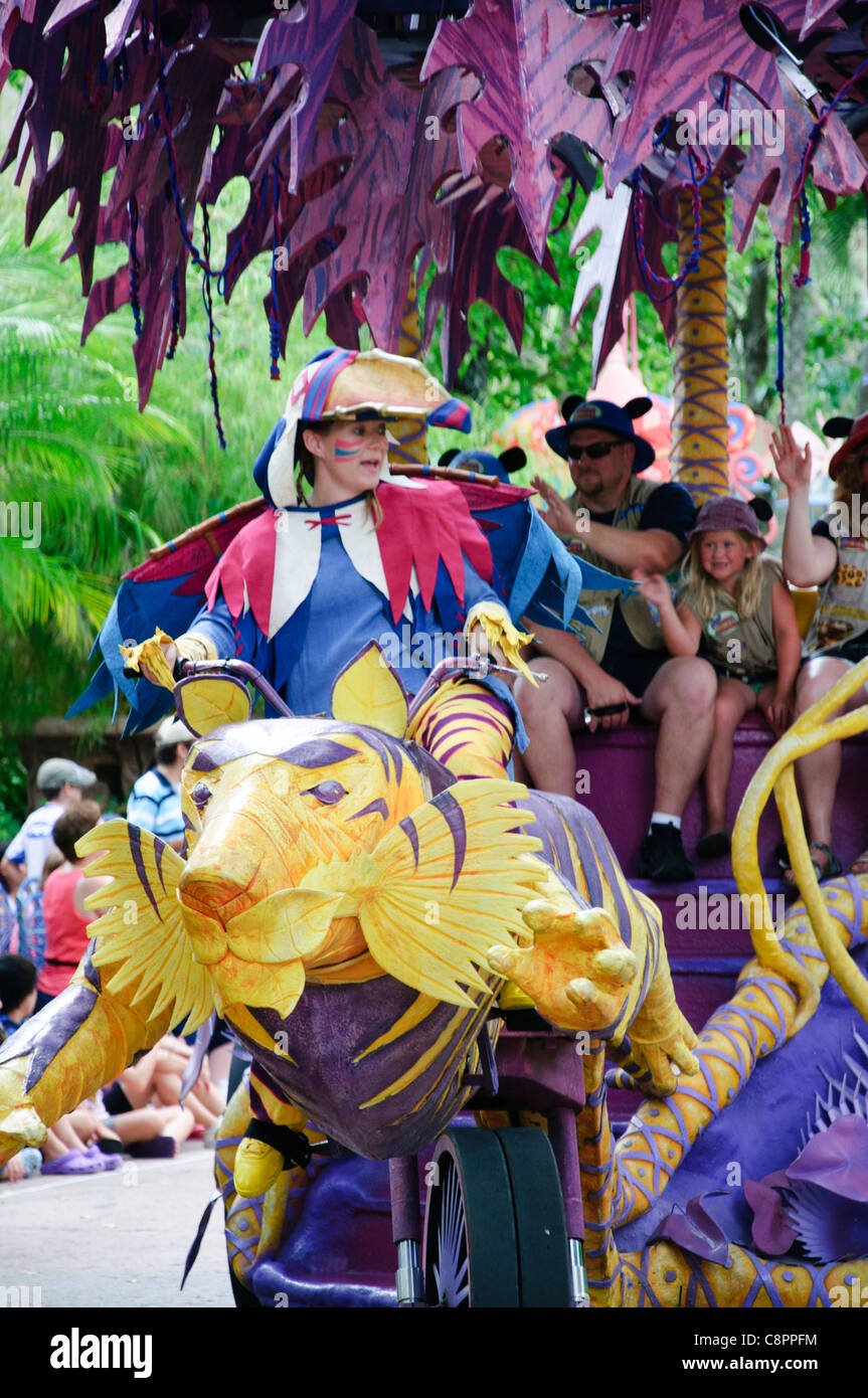 street entertainers and floats in mickeys jammin jungle parade in the ...