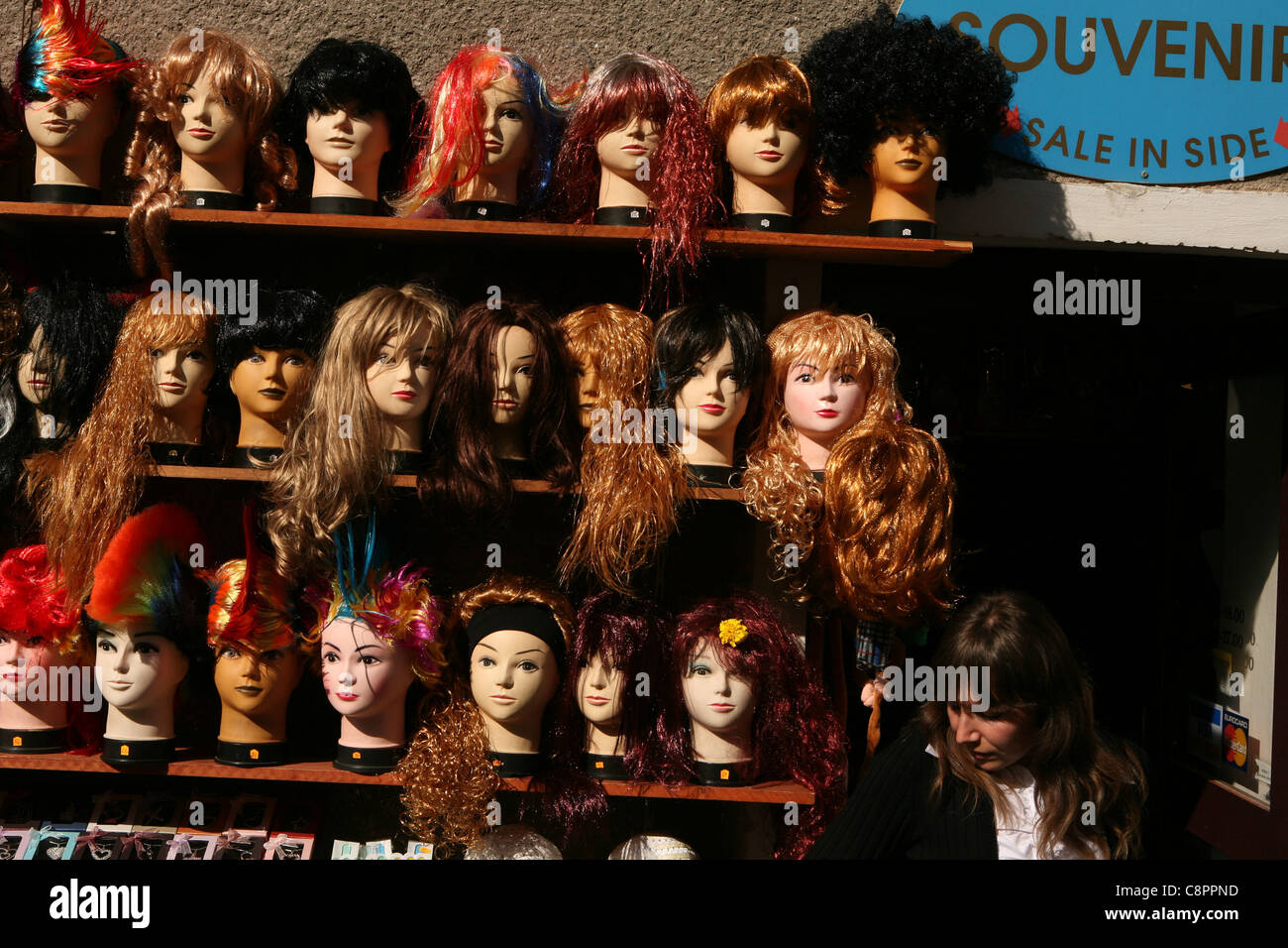 Wig shop in the village of Karlstejn, Czech Republic. Stock Photo