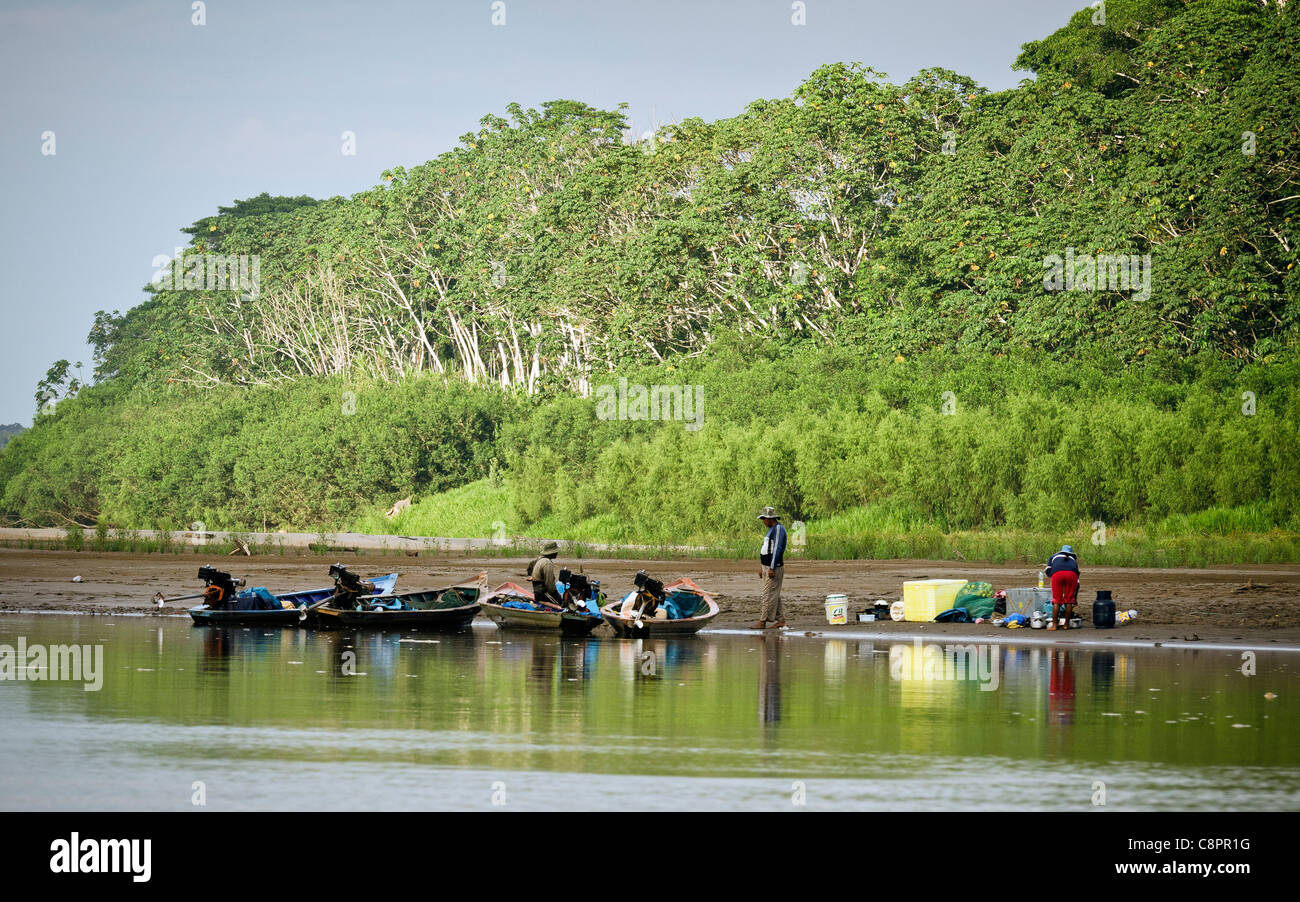Boats by the Tambopata river National Reserve Puerto Maldonado Amazon Area Peru Stock Photo