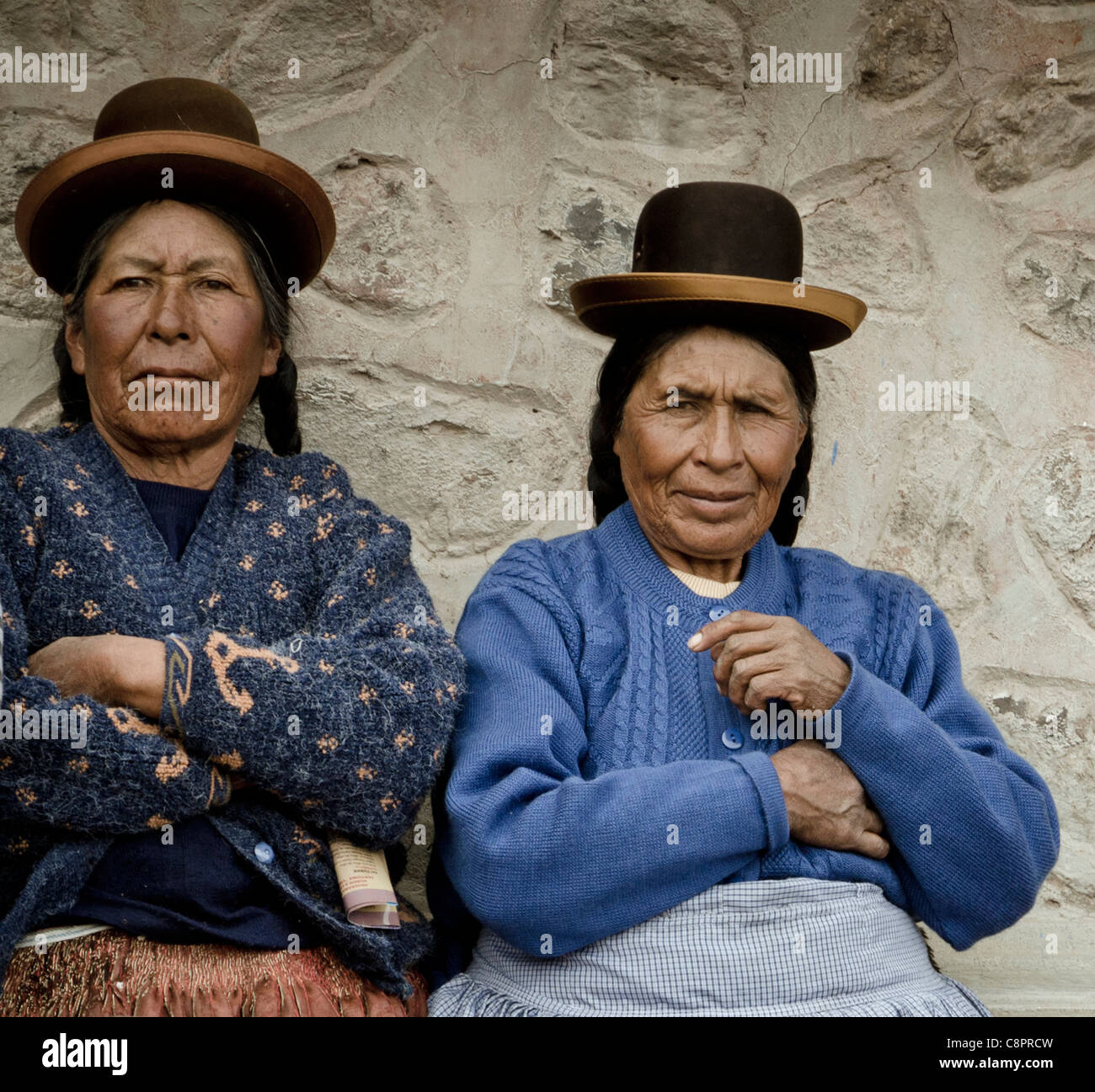 Peruvian women in traditional Quechua costumes in Chucuito Puno region Peru Stock Photo