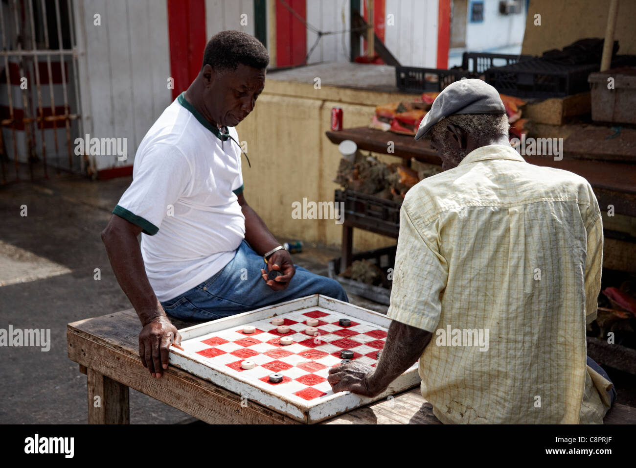 Playing checkers on the streets of Nassau. New Providence Island, Bahamas, Caribbean Stock Photo