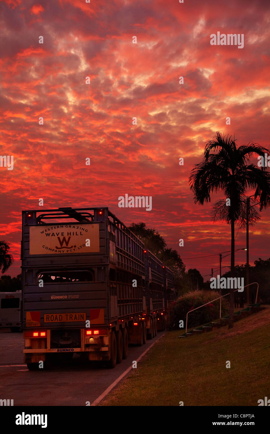 Road train and sunset, Emerald Springs Roadhouse, Stuart Highway, Northern Territory, Australia Stock Photo