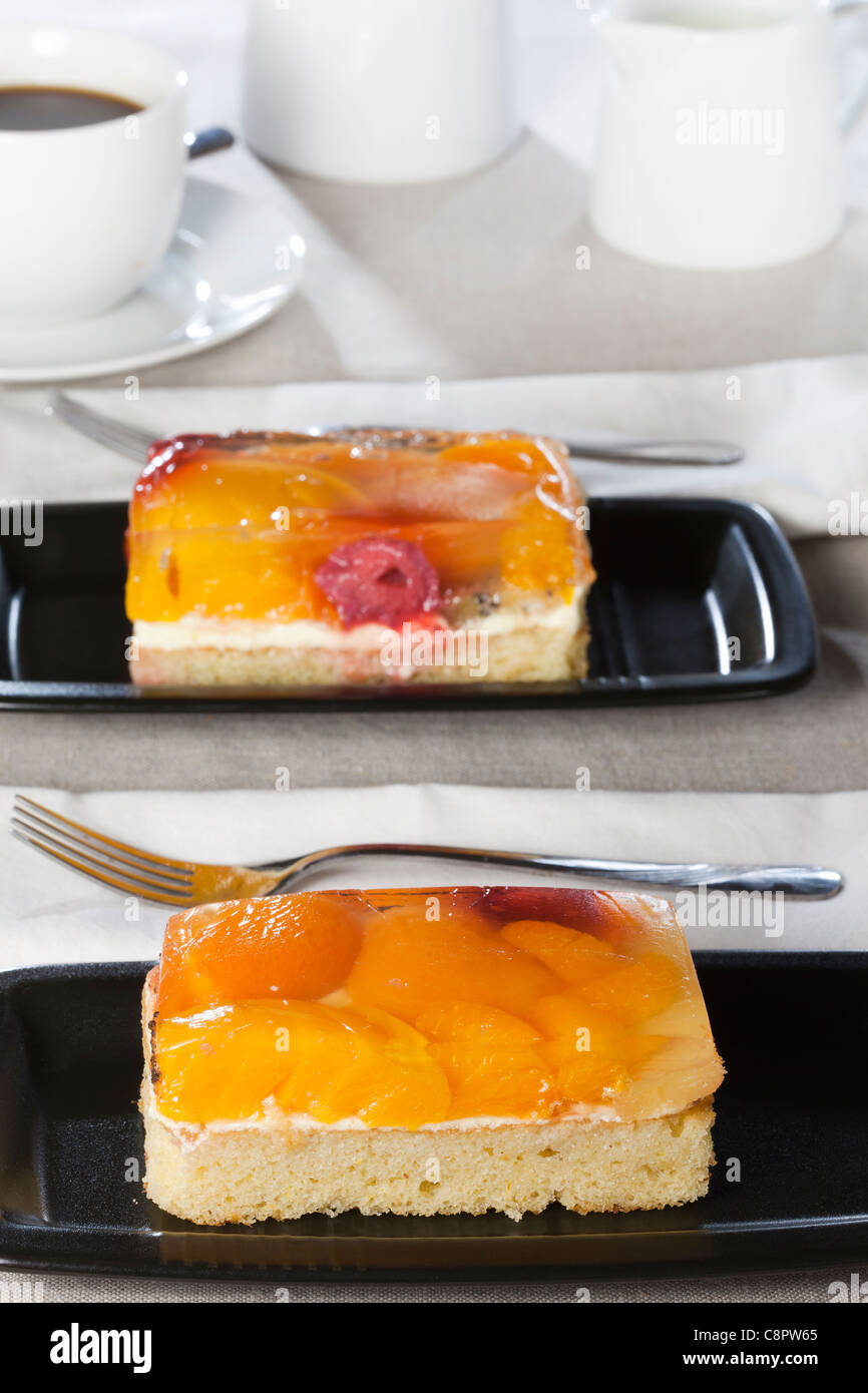 Cake topped with fresh fruit in jelly Stock Photo