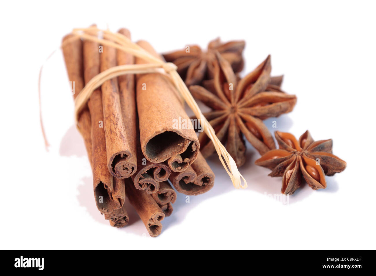 Chinese star anise with cinnamon isolated on white Stock Photo Alamy