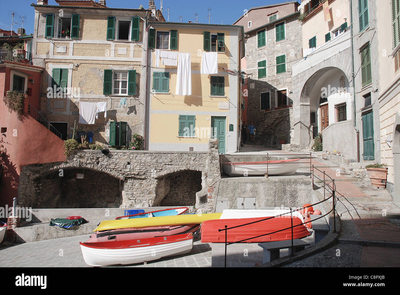Italy, Liguria, Tellaro, seafront houses and boats in Ligurian village