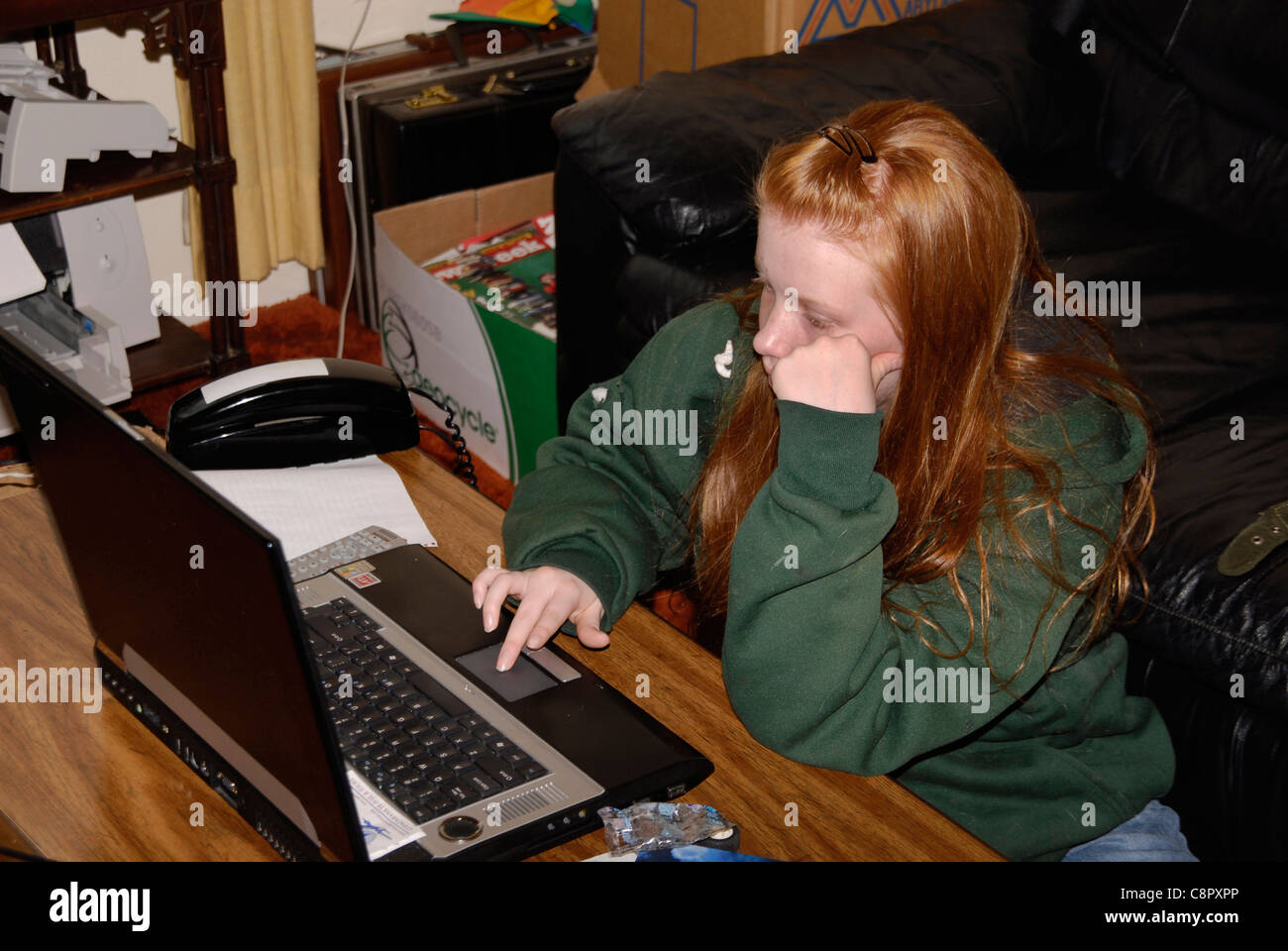 teen girl using a laptop Stock Photo - Alamy