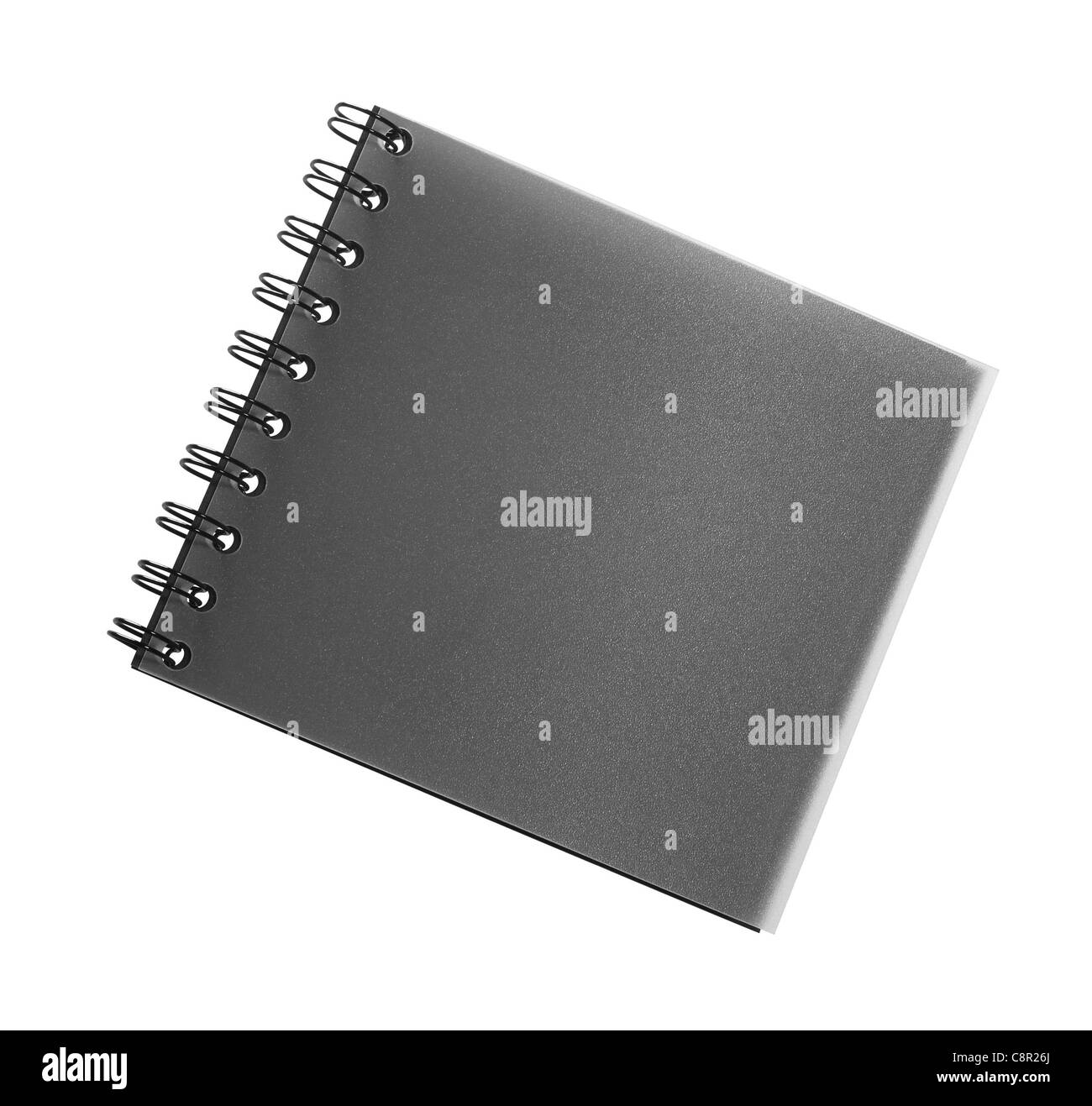 studio photography of a dark booklet with spiral binding isolated on white, with clipping path Stock Photo