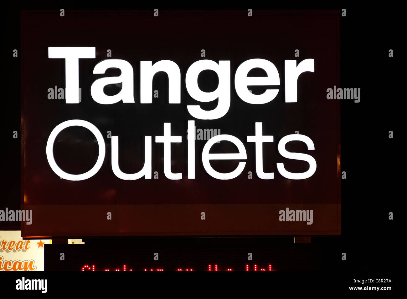 Tanger Outlets sign at night Stock Photo