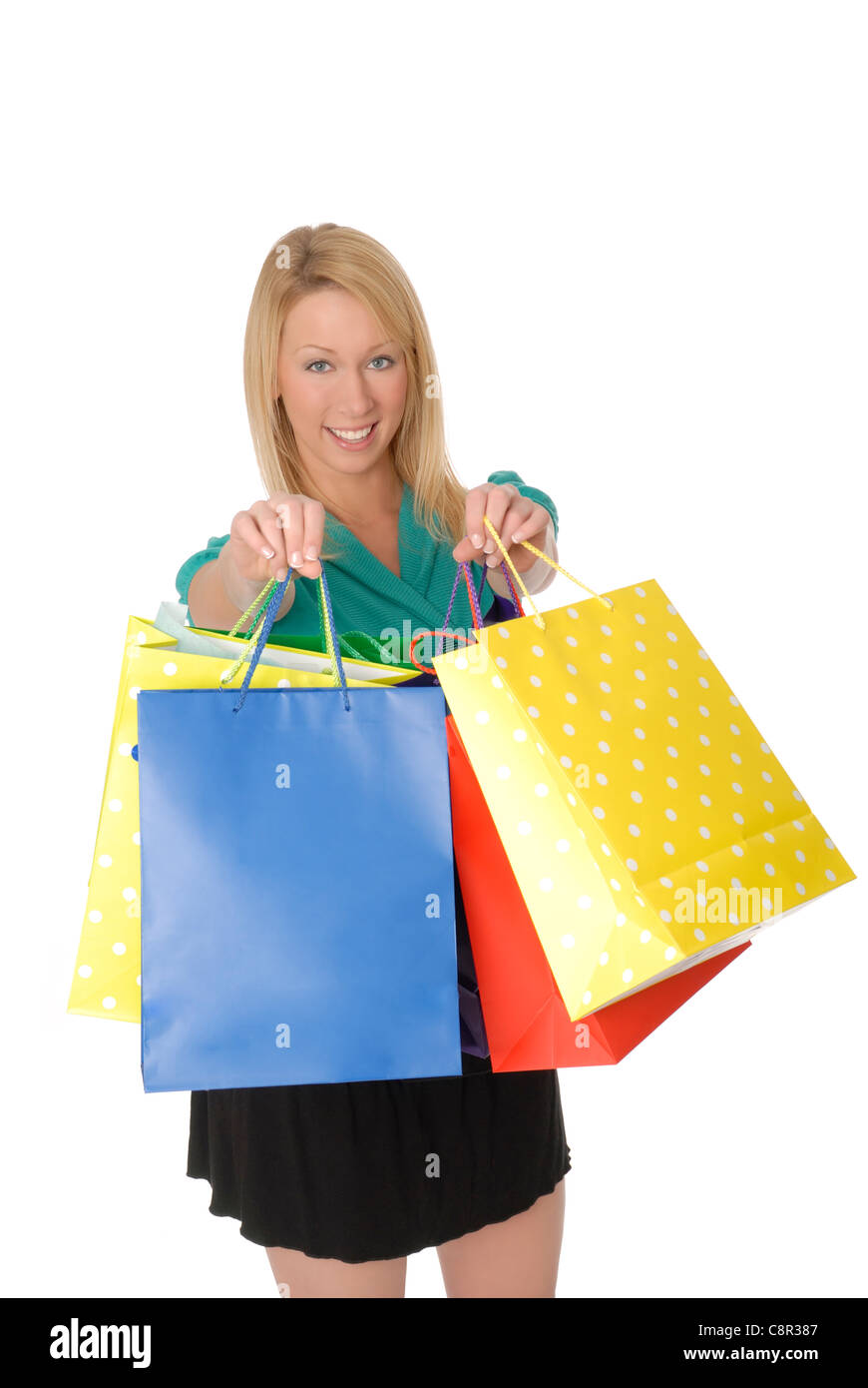 Pretty Blond Woman Holding Up Colorful Shopping Bags Stock Photo