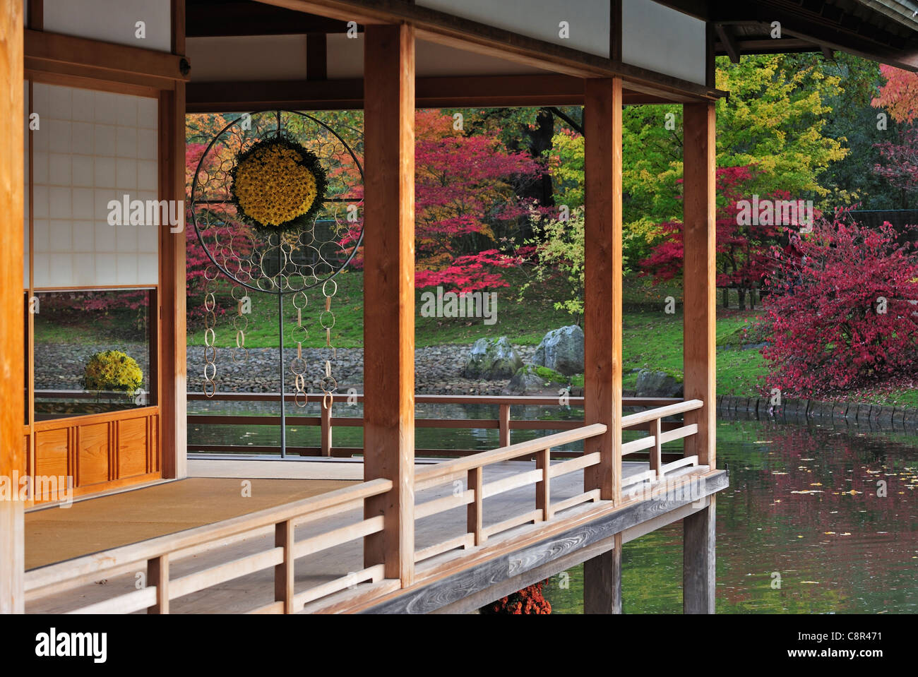 Traditional Pavilion Tea House In Japanese Garden With Tree