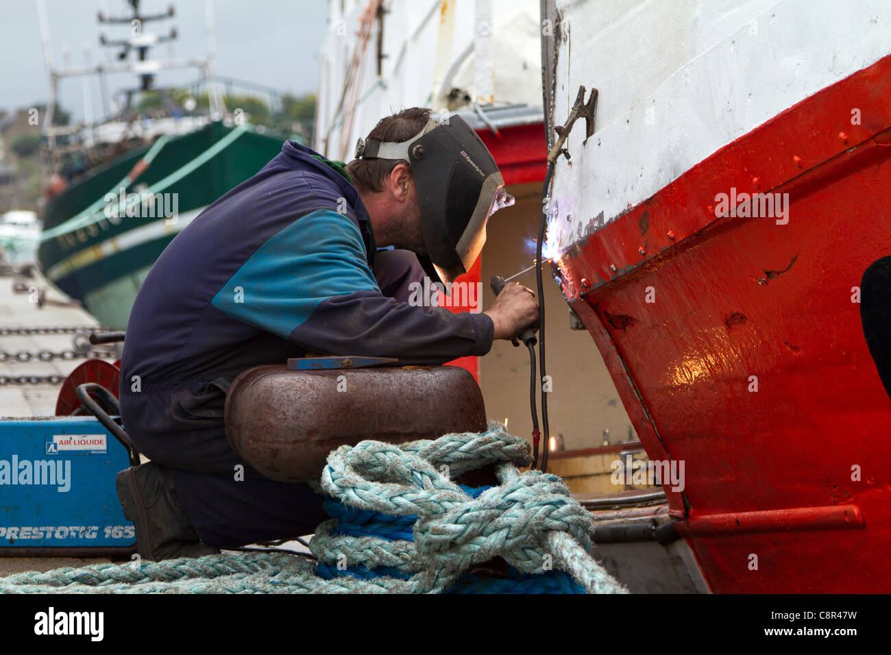 Arc welder at Roscoff Brittany France Stock Photo
