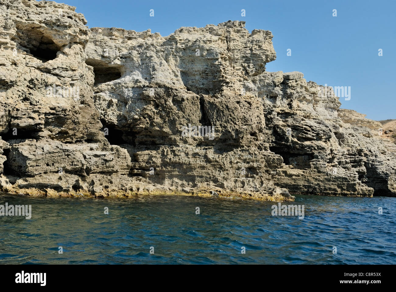sea landscape with porous rocks Stock Photo - Alamy