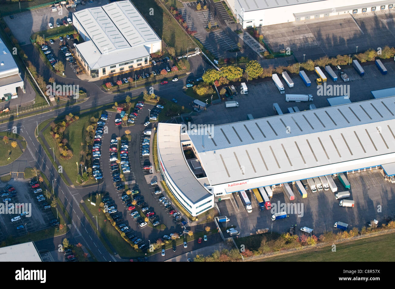 Aerial view of Hellman Worldwide Logisitcs warehouse and industrial unit near Fradley village Lichfield Staffordshire England Stock Photo