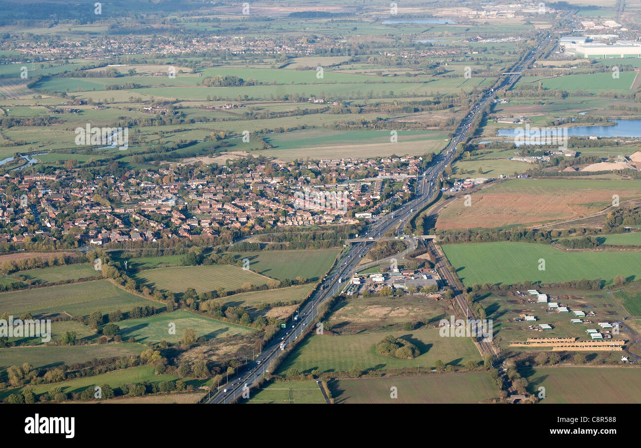 Aerial view of Alrewas village near Lichfield Staffordshire England with A38 dual carriageway