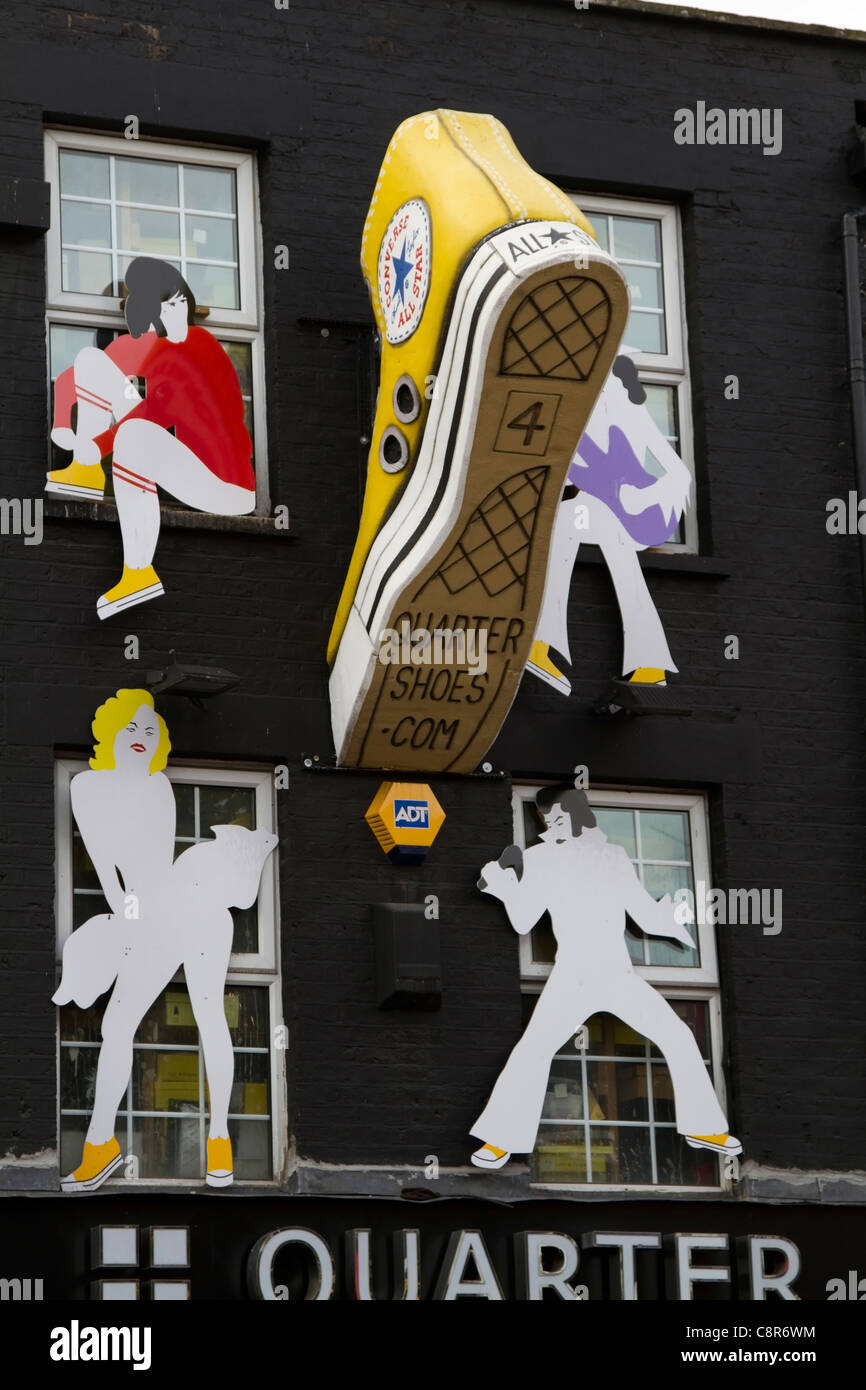 Sculptures on a shop front in Camden, North London Stock Photo Alamy