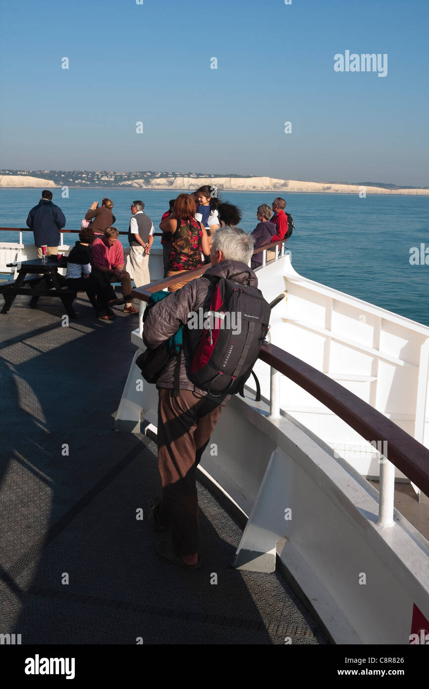 Passengers on a ferry crossing the Channel enjoy the view of the white cliffs of Dover, 2011 Stock Photo