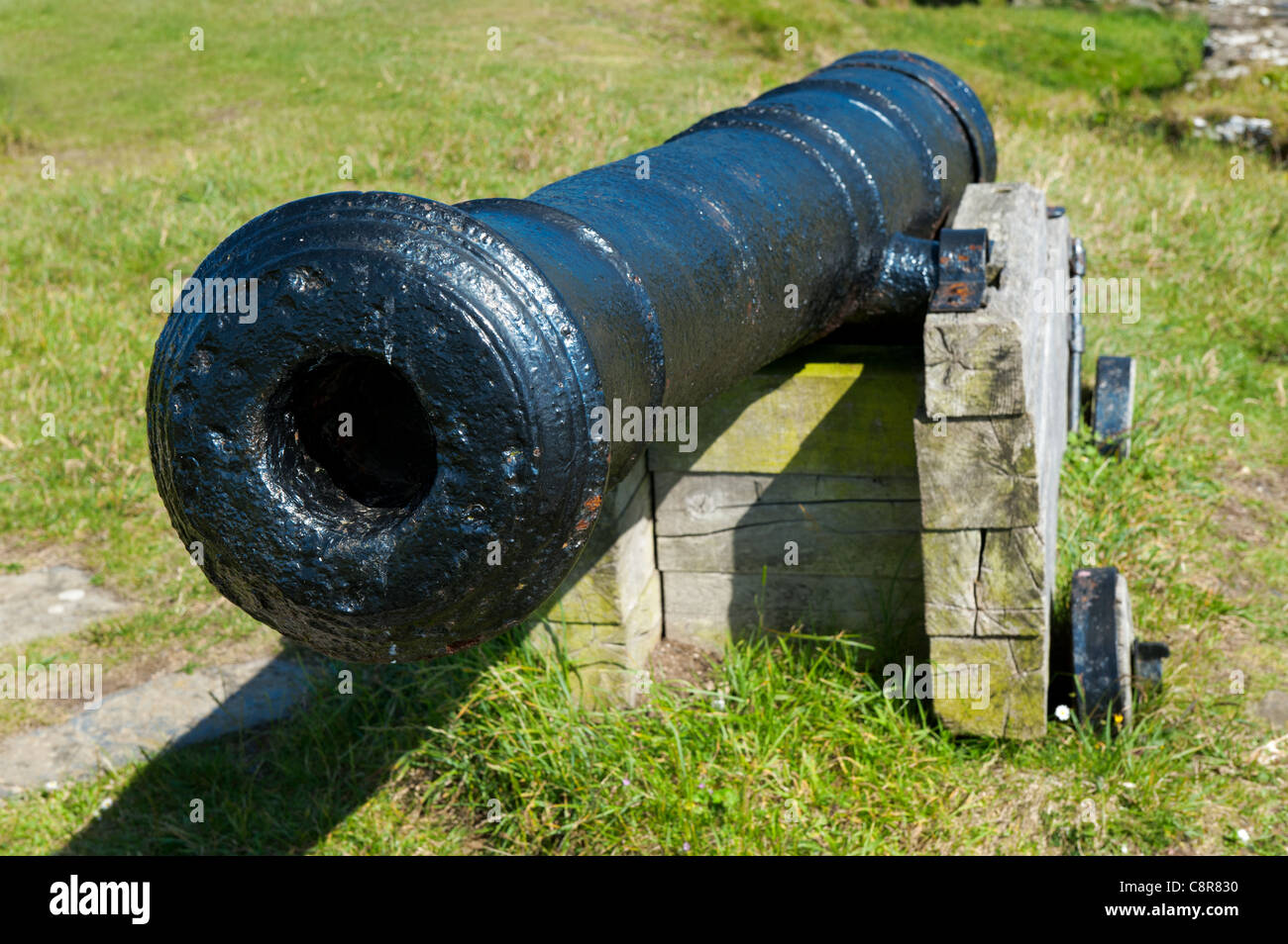 Naval cannon from 1780's defending Fishguard Lower Town Harbour. Stock Photo