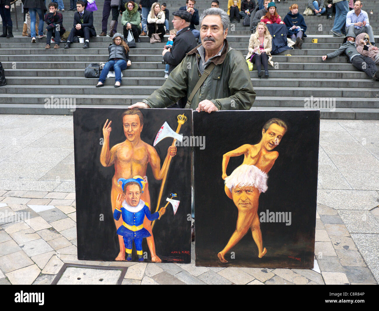 Artist Kaya Mar displays some of his caricatures Stock Photo