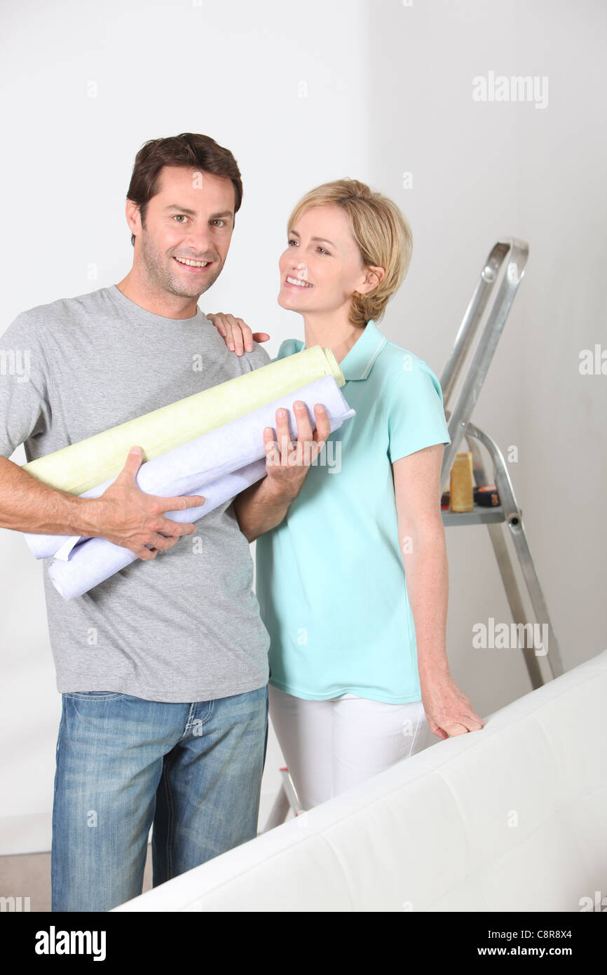 portrait of a couple with wallpaper Stock Photo - Alamy