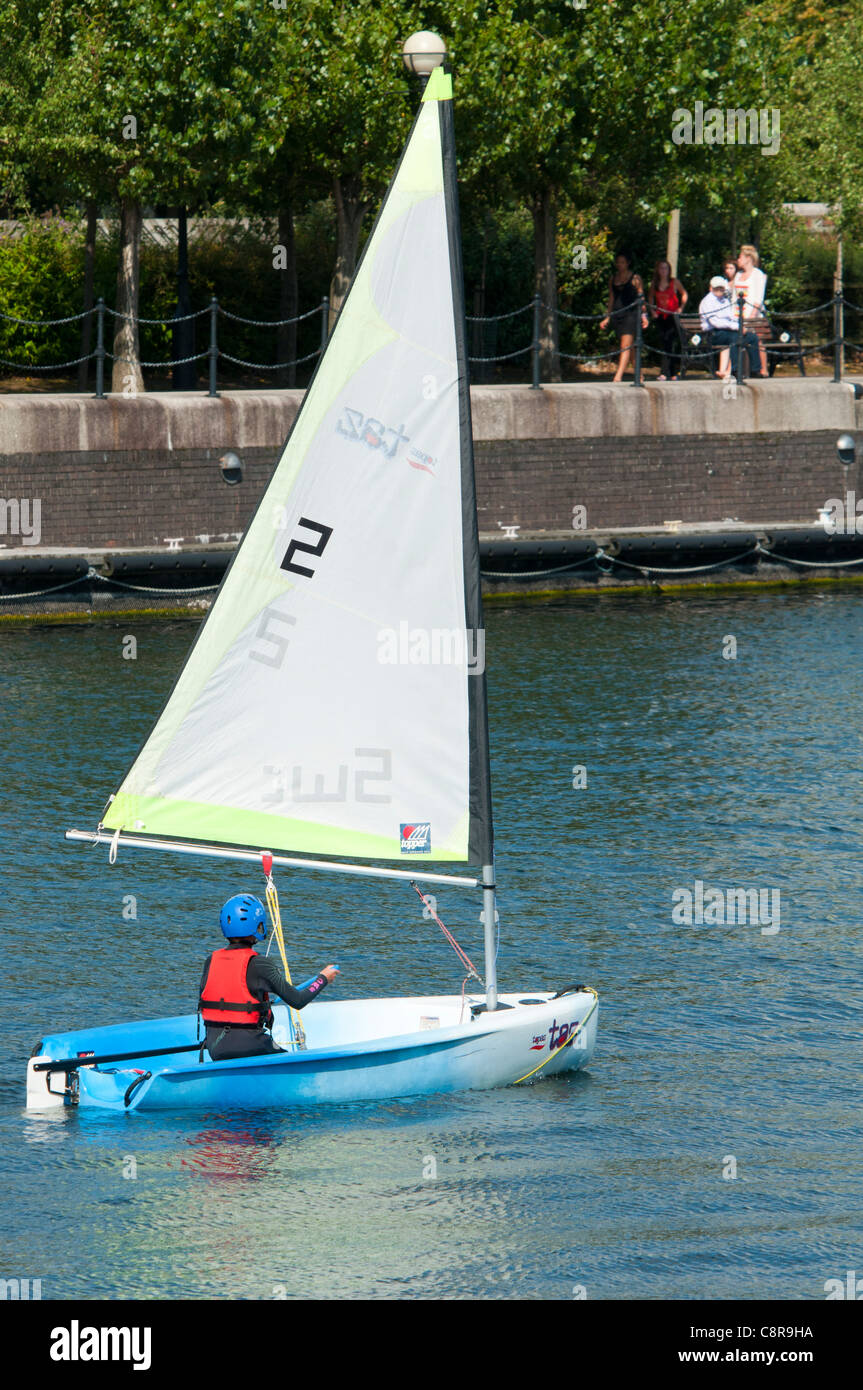 A child practicing sailing at the Watersports Centre, Salford Quays, Manchester, England, UK Stock Photo