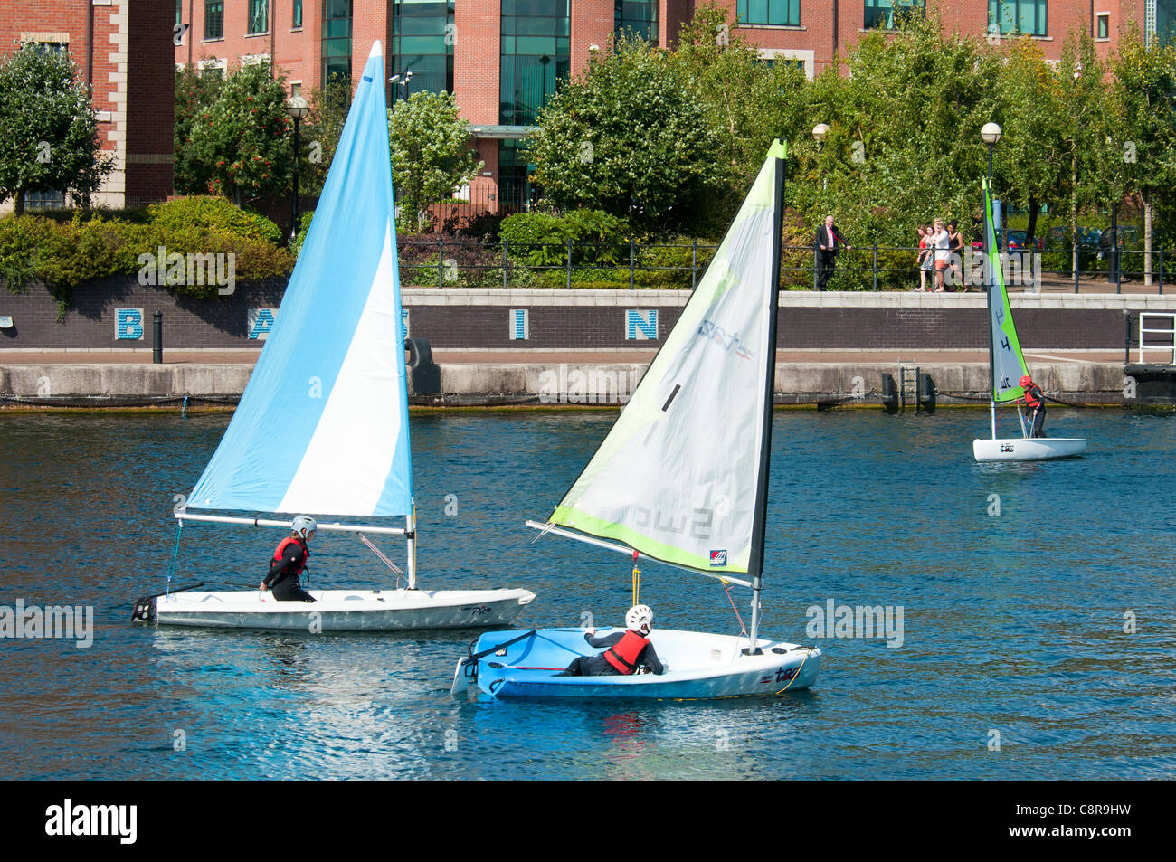 Children practicing sailing at the Watersports Centre, Salford Quays, Manchester, England, UK Stock Photo