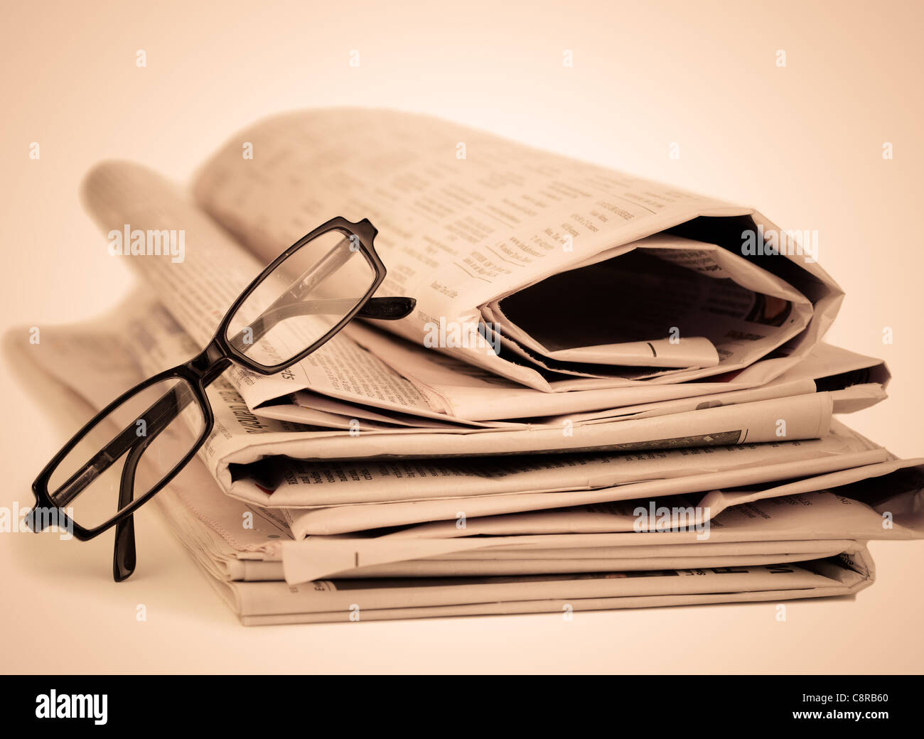 News paper stack glasses hi-res stock photography and images - Alamy