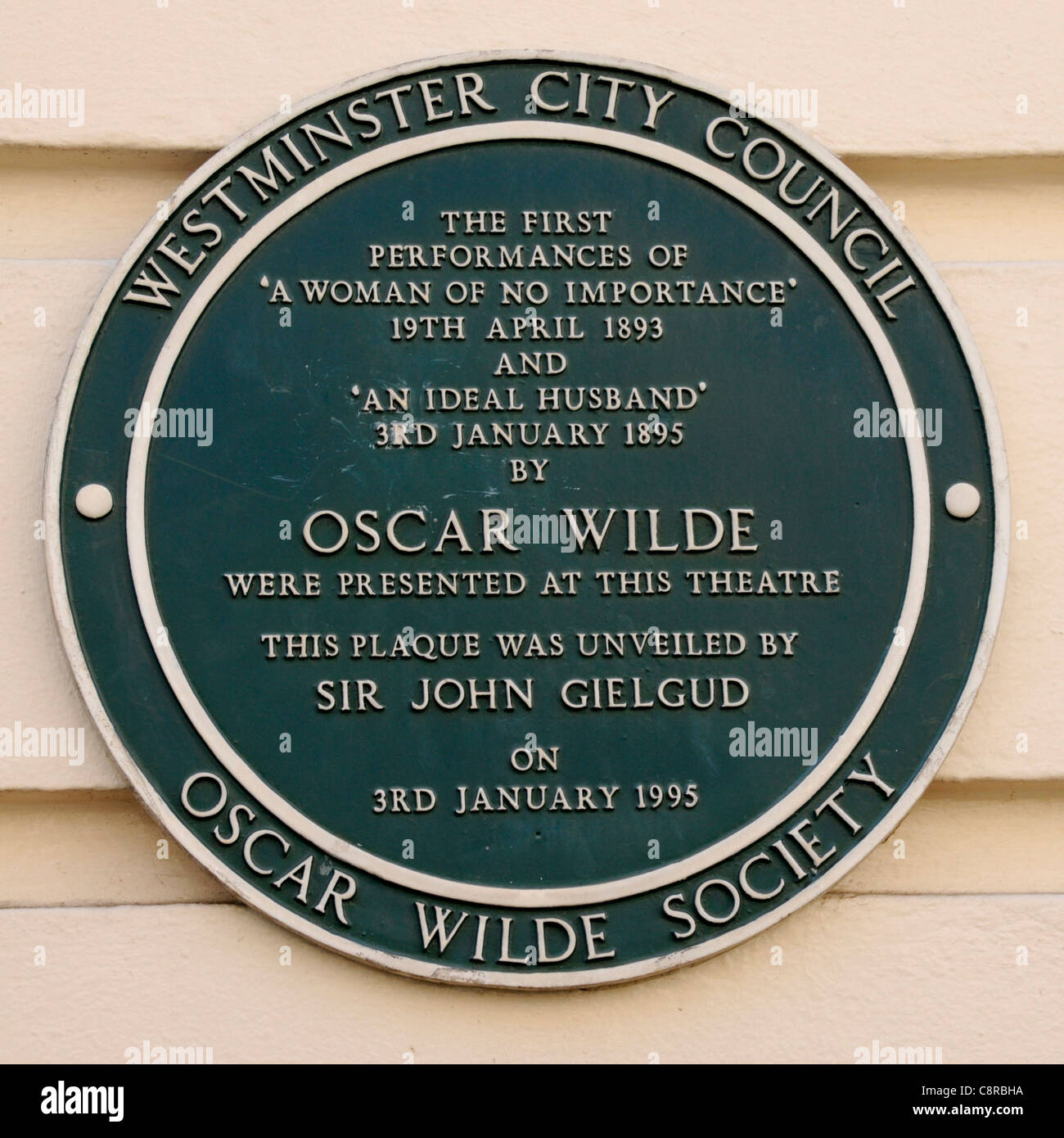 Oscar Wilde Society plaque at the Theatre Royal Haymarket London recording first performances of two Oscar Widle plays London West End England UK Stock Photo