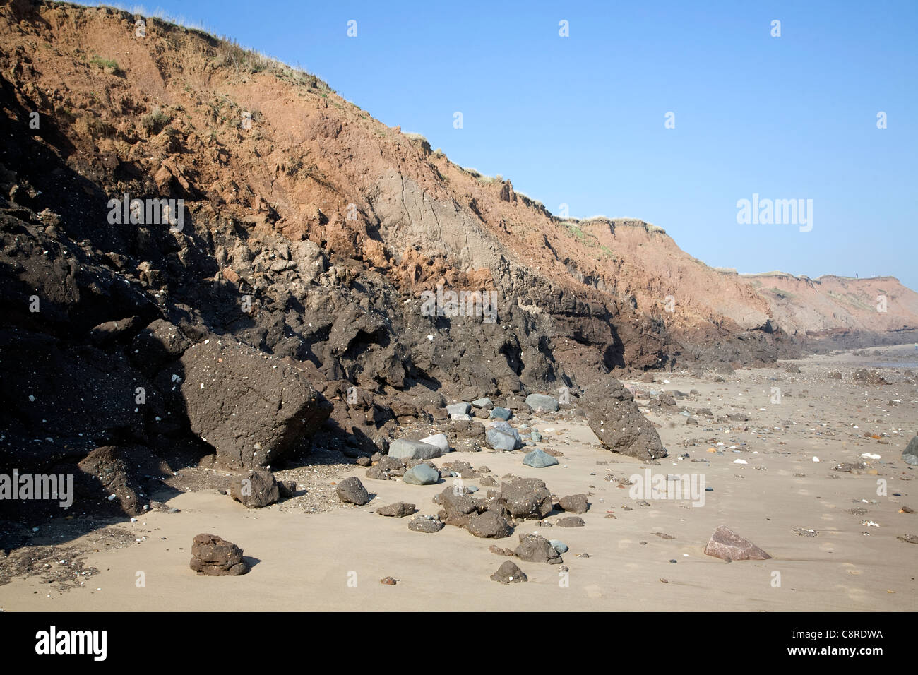 Rapidly eroding boulder clay cliffs on the Holderness coast, Mappleton, Yorkshire, England Stock Photo