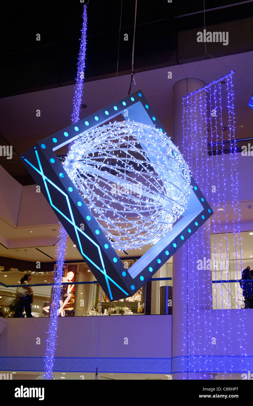 Christmas decorations in the Raffles City shopping mall, City Hall, Singapore Stock Photo